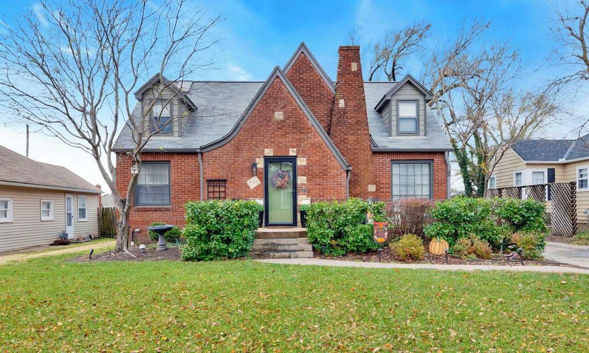 Wichita House | Charming Tudor Retreat in Perfect Location with Fenced Yard and Garage