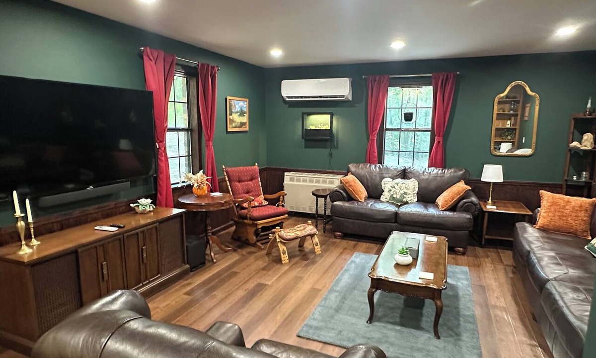 Iuka Cottage | Cozy woodland retreat with modern comforts and rustic charm.
