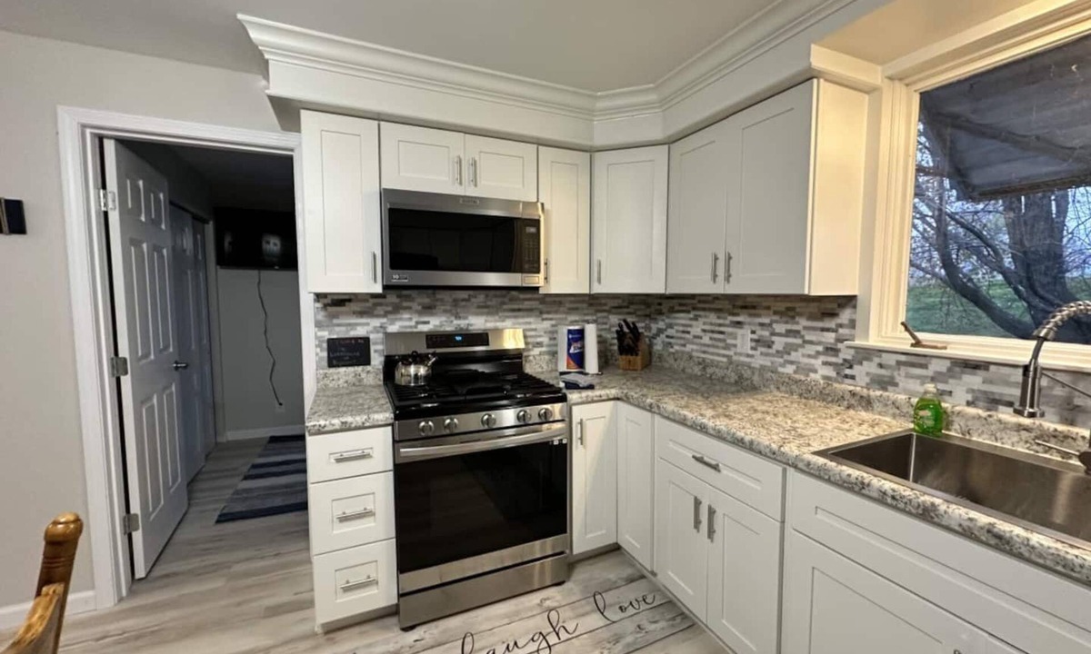 Keyesport Cottage | Escape to our newly remodeled, pet-friendly 3BR/2BA home in Keyesport—just a short walk to Carlyle Lake! Sleeps 7. Perfect for families, enjoy lake days, a full kitchen, workspace, and a cozy fire pit for relaxing evenings.