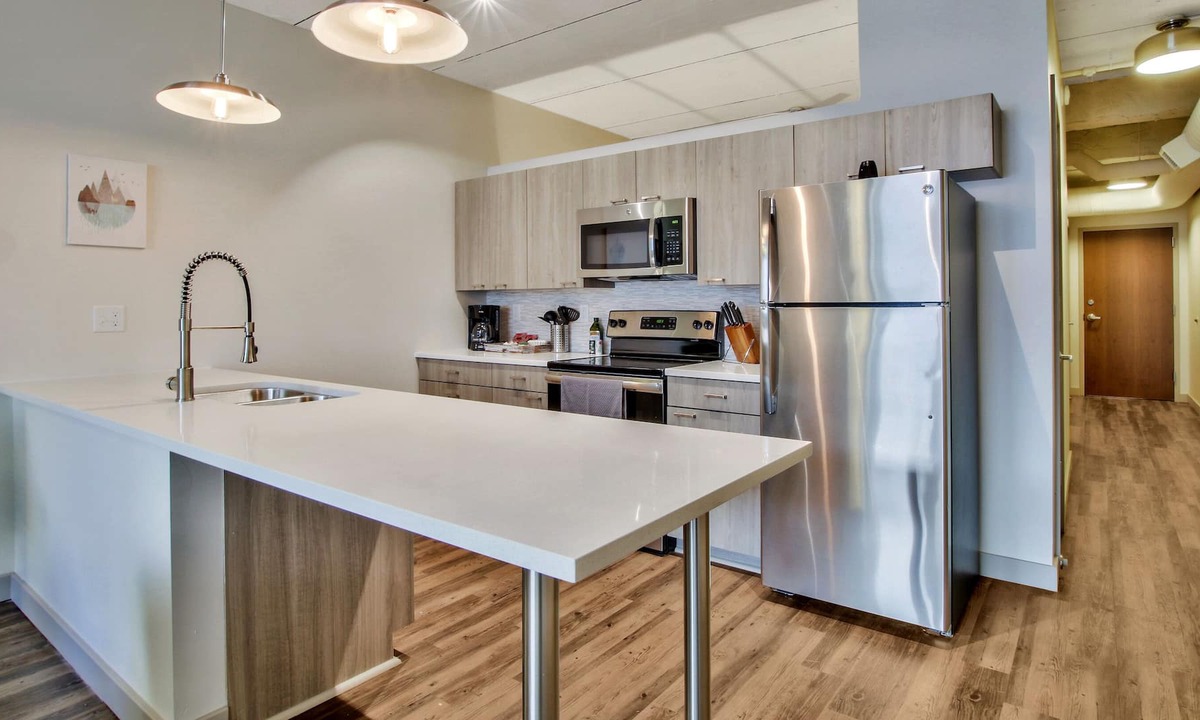 Downtown Wichita Apartment | In Unit Laundry with Spacious Kitchen in Art Gallery Alley