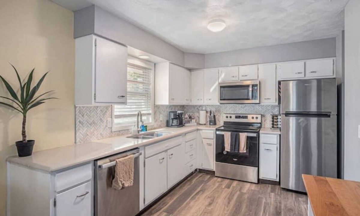 North Central Omaha House | Modern 4BR NW Omaha, Garage, Fenced Yard, EV Charger, W/D, Pet-Friendly