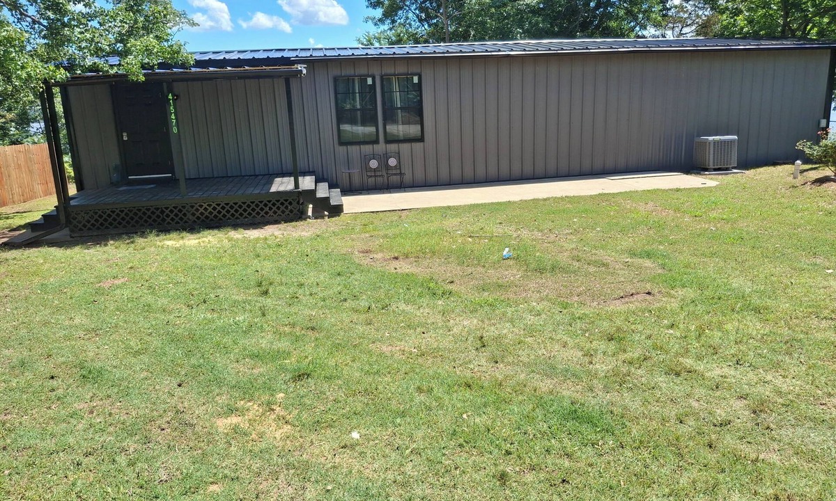 Checotah House | Newly remodeled lakefront home with hot tub, just off I-40