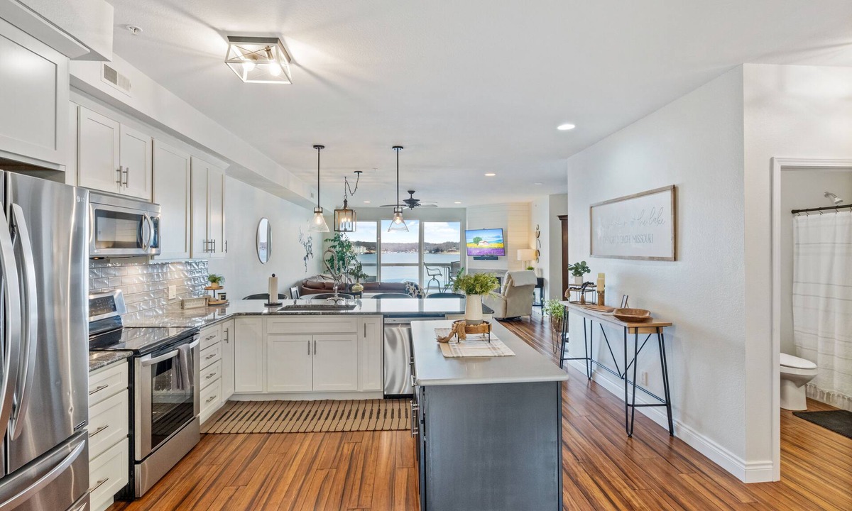 Osage Beach Condo | Revitalize at Lands' End! - Main Channel View, Shaded Deck, Waterfall Pool, WiFi