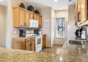 2 Bedroom, 2 Bathroom Golf Condo featuring Private, Covered Balcony with Pool View