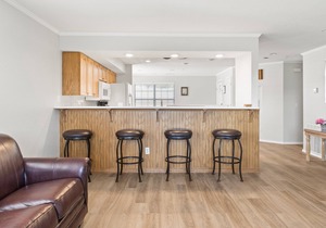 2 Bedroom, 2 Bathroom Walk-in Condo with Golf Course View from All-Season Sunroom