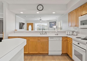 2 Bedroom, 2 Bathroom Walk-in Condo with Golf Course View from All-Season Sunroom