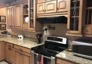 STUNNING LAKEFRONT CONDO WITH LAKE VIEW AND A PRIVATE BOAT SLIP