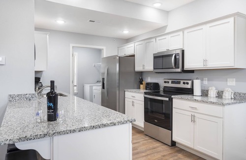 Branson West Condo | Hot Tub, Golf Course On Site, Arcade, Pvt Deck- HighEnd Decor! Bright Floorplan