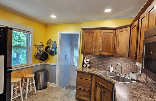 Aksarben - Elmwood Park House | 2-bedroom home w/deck, private backyard, and outdoor fireplace.