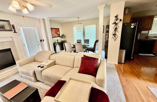I-435 West KC-KS House | 3-BR 2.5BA home-quaint KCK neighborhood. Fenced yard, hot tub; perfect location!