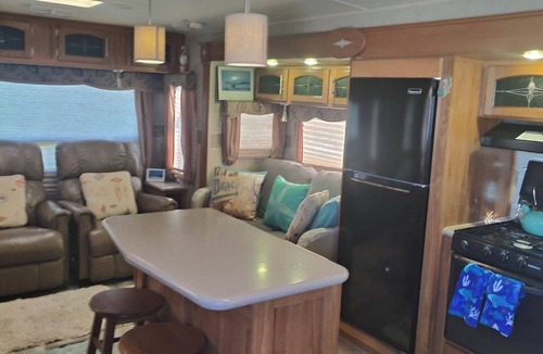 North Topsail Beach House | 35 ft RV, large deck, intercoastal sunset, campground across street from ocean