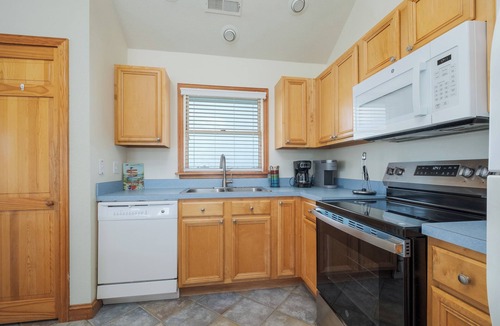 Waves House | 7170- Endless Summer Nights, Dog-Friendly 4BR Waves Escape | Pool & Hot Tub