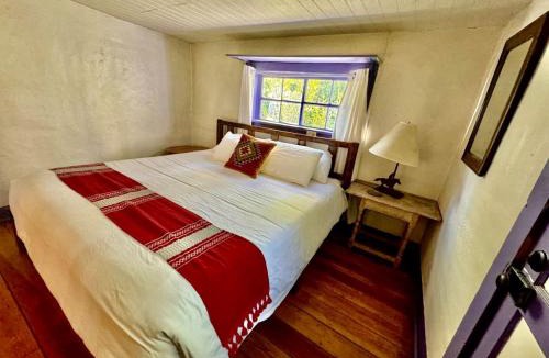 San Cristobal House | Artistic Garden Casita on Organic Farm in New Mexico