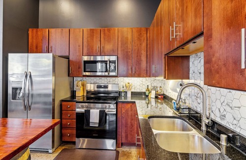 Downtown Louisville Condo | BEST Louisville Location + NuLu + Private Garage + Walk to Distilleries