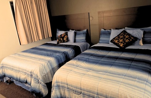 Hutchinson Hotel | Blue Way Inn by Jasper Hutchinson