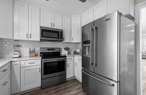 Atlantic Beach Cottage | Buddy's Sandcastle: room for family, friends, and pets. Fenced yard.