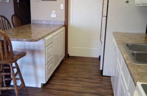 Elephant Butte House | Charming 3 Bedroom house w/fire pit, water fall, outdoor grill, wrap around deck