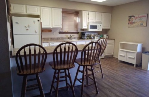 Elephant Butte House | Charming 3 Bedroom house w/fire pit, water fall, outdoor grill, wrap around deck