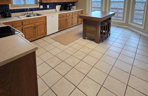 Warrensburg House | Charming 3-bedroom farmhouse with large front and back decks. Fenced in backyard