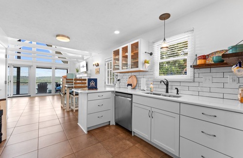 Blue Eye Cottage | Charming Cottage w Gorgeous Lake View-Stunning Sunsets-Hot Tub-Nature Trail to Lake-Dog Friendly