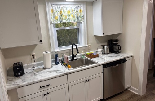 Lawrence House | Close to KU & Mass, ample off street parking, all on one level!