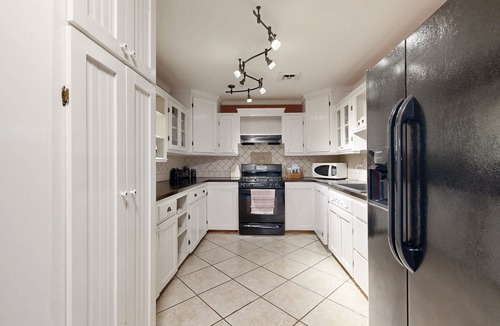 Checotah House | Close to Lake Eufala with a private firepit and covered back deck