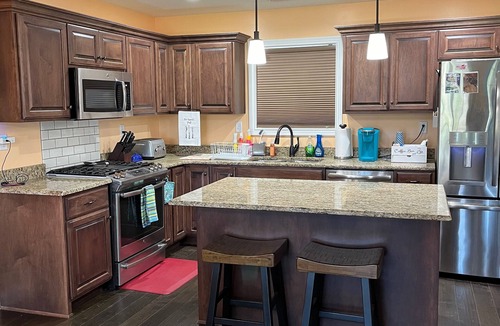 Buechel House | Cozy 3-bedroom house in charming Louisville with a tropical feel