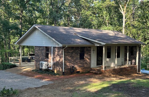 Iuka Cottage | Cozy woodland retreat with modern comforts and rustic charm.