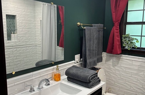 Iuka Cottage | Cozy woodland retreat with modern comforts and rustic charm.