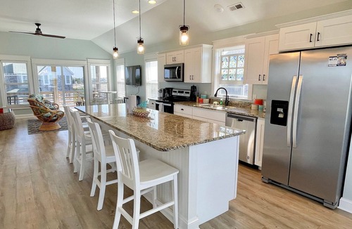 Ocracoke House | Dog Friendly close to Ocracoke's beaches, screened porch, deck views