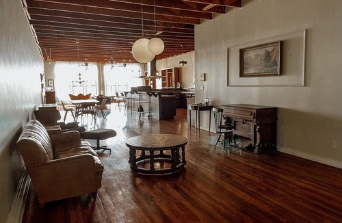 Enid House | Downtown loft apartment with excellent views, furnishings and location on square
