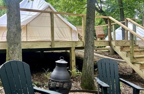 Gentry RV Rental | Enchanting Mountain Glamping Tents with Elevated Decks and Fire Pit Near Gentry, AR
