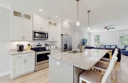 Morehead City House | Four townhomes - heart of the city - elevator, balconies, fast WiFi, central AC