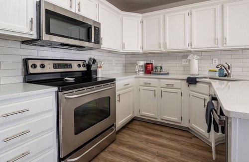 Smithville House | Galway Street Getaway: clean, comfy Smithville home in a quiet neighborhood. 2 bedrooms + bonus basement sleeper sofa, 3 full baths (primary ensuite + basement bath). KC attractions are typically 30–45 min away.
