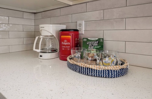 Smithville House | Galway Street Getaway: clean, comfy Smithville home in a quiet neighborhood. 2 bedrooms + bonus basement sleeper sofa, 3 full baths (primary ensuite + basement bath). KC attractions are typically 30–45 min away.