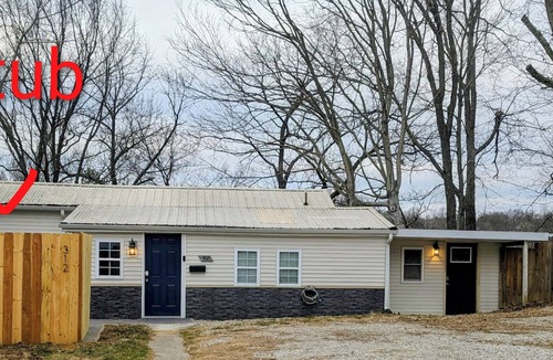 Corydon House | Hillside Hottie! Downtown Corydon property with a hot tub and "Hottie" decor