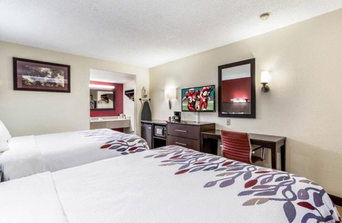 Allison Hotel | Historic Route 66 Stay w/Pool & Gym Stay with Breakfast | 4.86 mi to Rex Museum