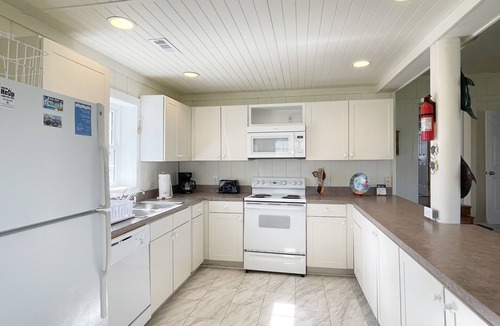 Ocracoke House | Hoi Toide Low Toide: Two homes in one. Canal front, boat docking.