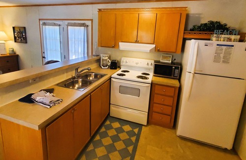 Blue Eye Cottage | Lake "Beach" Cottage w/Boat Slip & Rentals, Dock & Hot Tub!