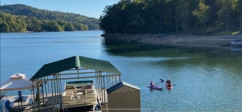 Rock Harbor House | Lakefront Retreat Sleeps 16 Dock Boat Slips Grill