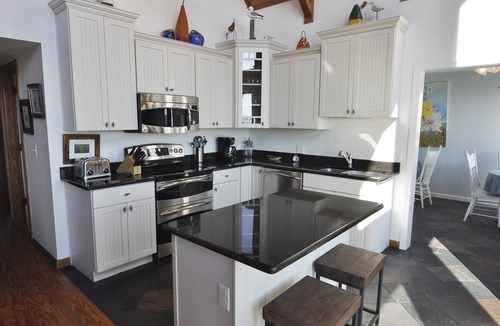 Ocracoke House | Landshark: Dog friendly waterfront home, game room, sound views.