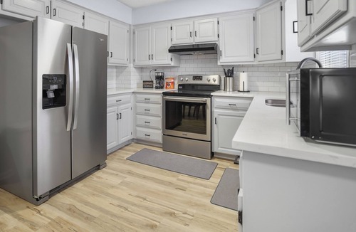 Olathe Condo | Large groups 4 Bedrooms 3 Full Baths TV all rooms