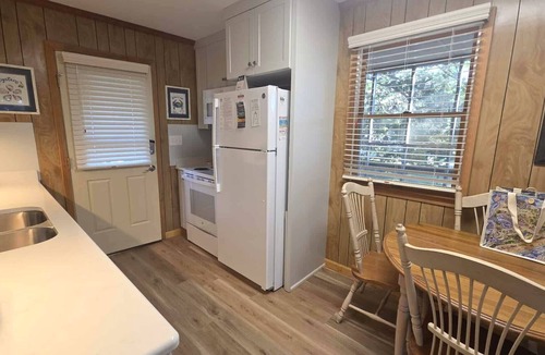 Ocracoke House | Lindley: Near restaurants, spacious screened porch, rooftop deck.