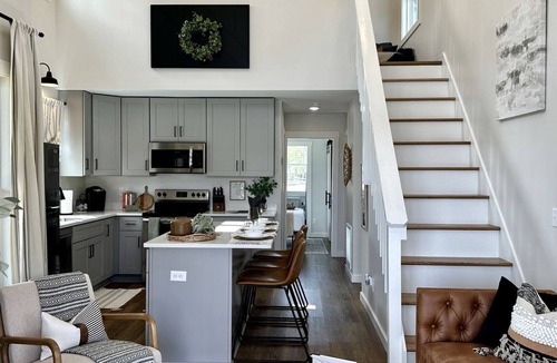 Tracy City Cabin | Lofted Tiny Retreat with Private Lake Dock and Spa in Tennessee