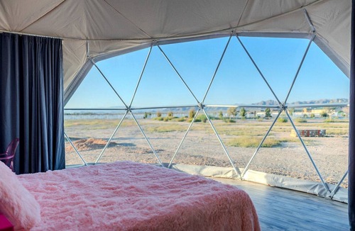 Willcox Cabin | Luminous Cozy Dome with a Barbie Collection Above Bed in Willcox, Arizona