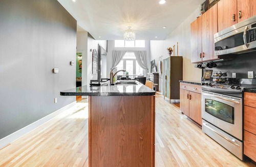 East Market District Apartment | Luxe speakeasy-inspired condo in the heart of NuLu