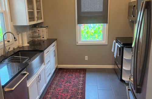 Aksarben - Elmwood Park House | Luxury 4 bedroom house with amazing outdoor lighting and water feature!