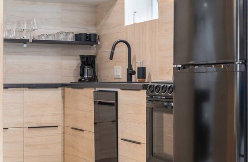 Aksarben - Elmwood Park Apartment | Luxury King Studio & Heated Floors!