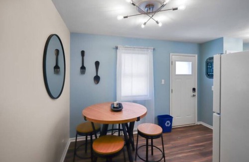 North Central Omaha House | Modern 4BR Duplex Near Dodge, Garage, Fenced Yard, EV Charger, W/D