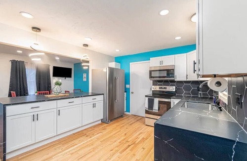 West Omaha House | Modern 6BR Millard, 3 King Suites, Workspace, W/D, Pet-Friendly, 940 Mbps